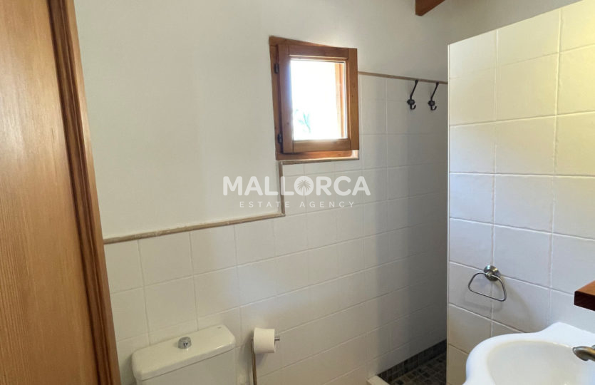 bathroom2 window shower sink wood beams tiles light traditional home binissalem mallorca for sale