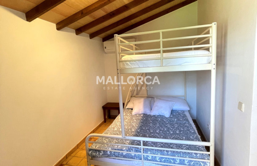 bedroom1 beams wood bunk beds air conditioning lighting traditional mallorquin home in binissalem mallorca for sale